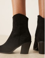 Rational heeled western boots in black