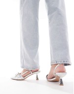 Simmi London Dala pointed kitten heel sling backs with eyelet buckle detail in silver metallic