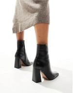 Wide Fit Everest flared heel boots in black