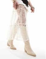 Taxas western boots in faux suede cream