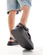 clog with buckle detail strap in black