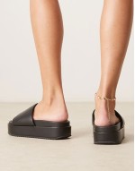 Festival flatform footbed mules in black
